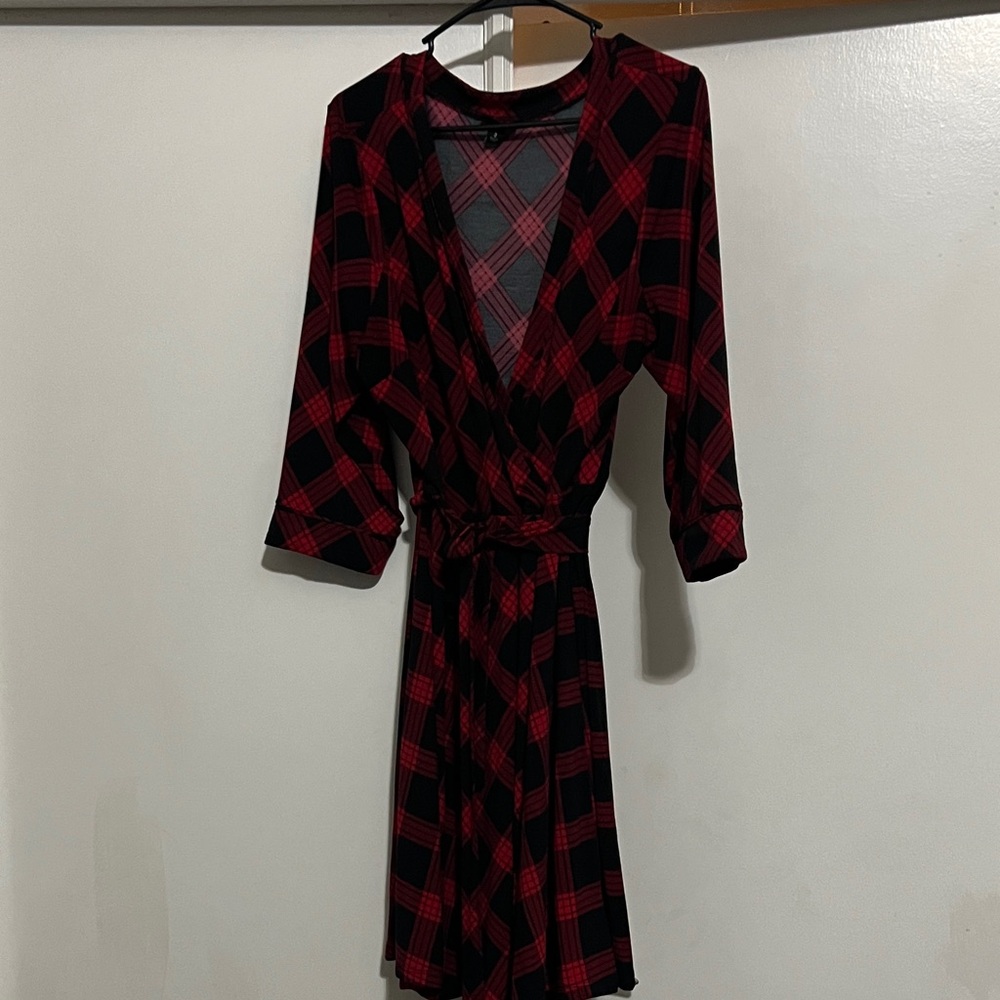 Torrid red and black buffalo plaid stretch knit faux wrap dress.
